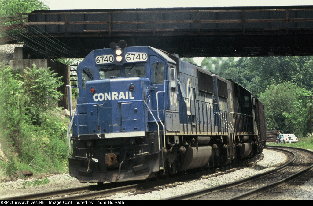 CR 6740 leads a CSX freight west beneath NS's overpass